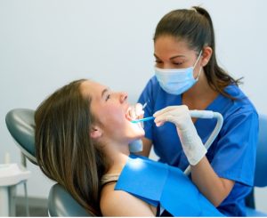 how do dentists clean teeth​